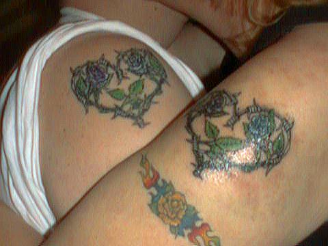 These are the matching tattoos that my sweety and I got. The blue rose is 